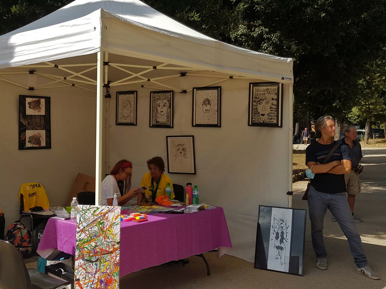 Immagine di un gazebo in occasione di un evento di promozione legato ad Insieme per il bene comune - GDD Italia 2021